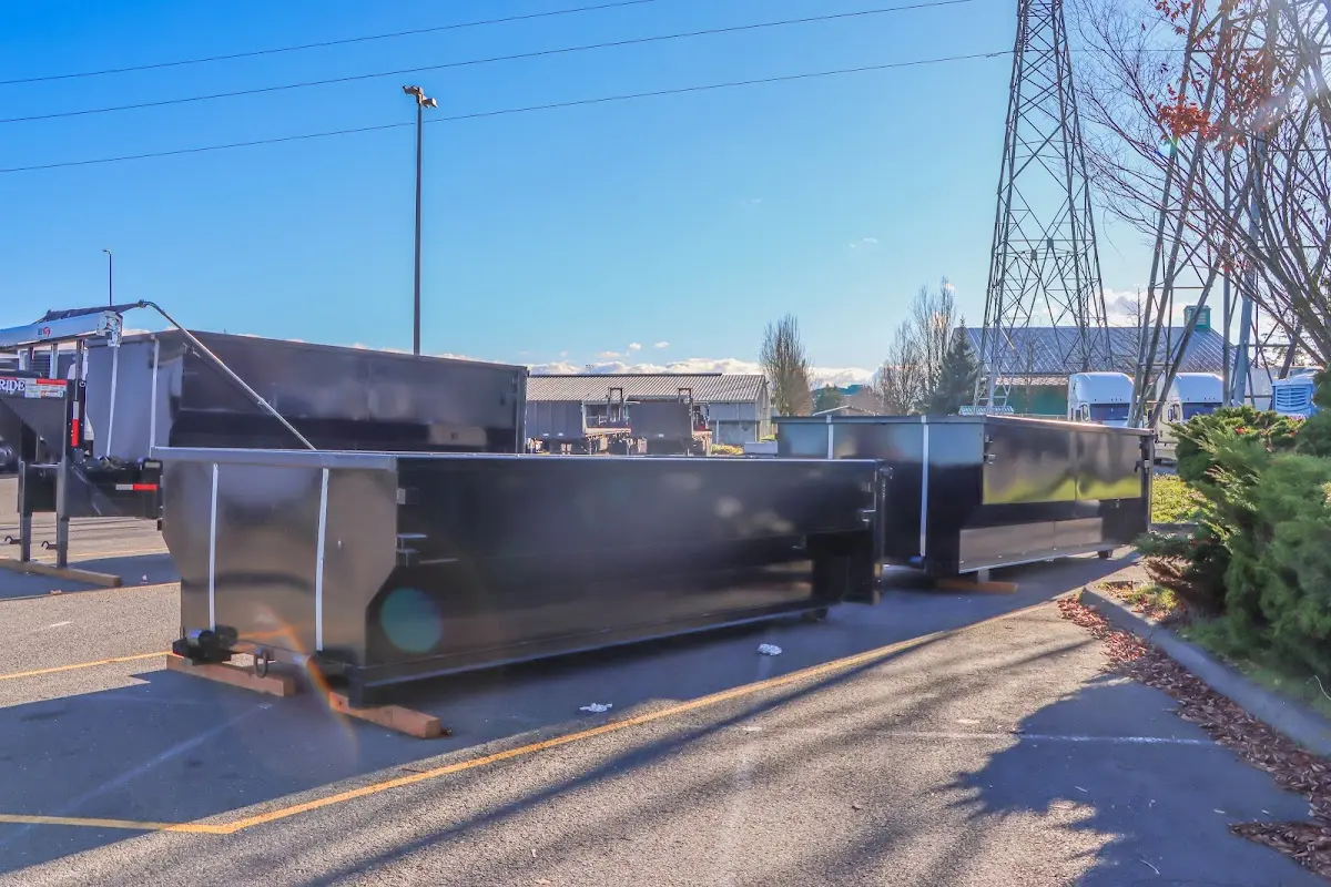 Roll-off dumpster ready for waste disposal at job site for Concrete Dumpster Rental in Hastings